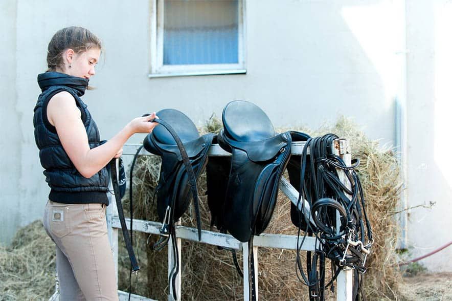 Girl with Saddles